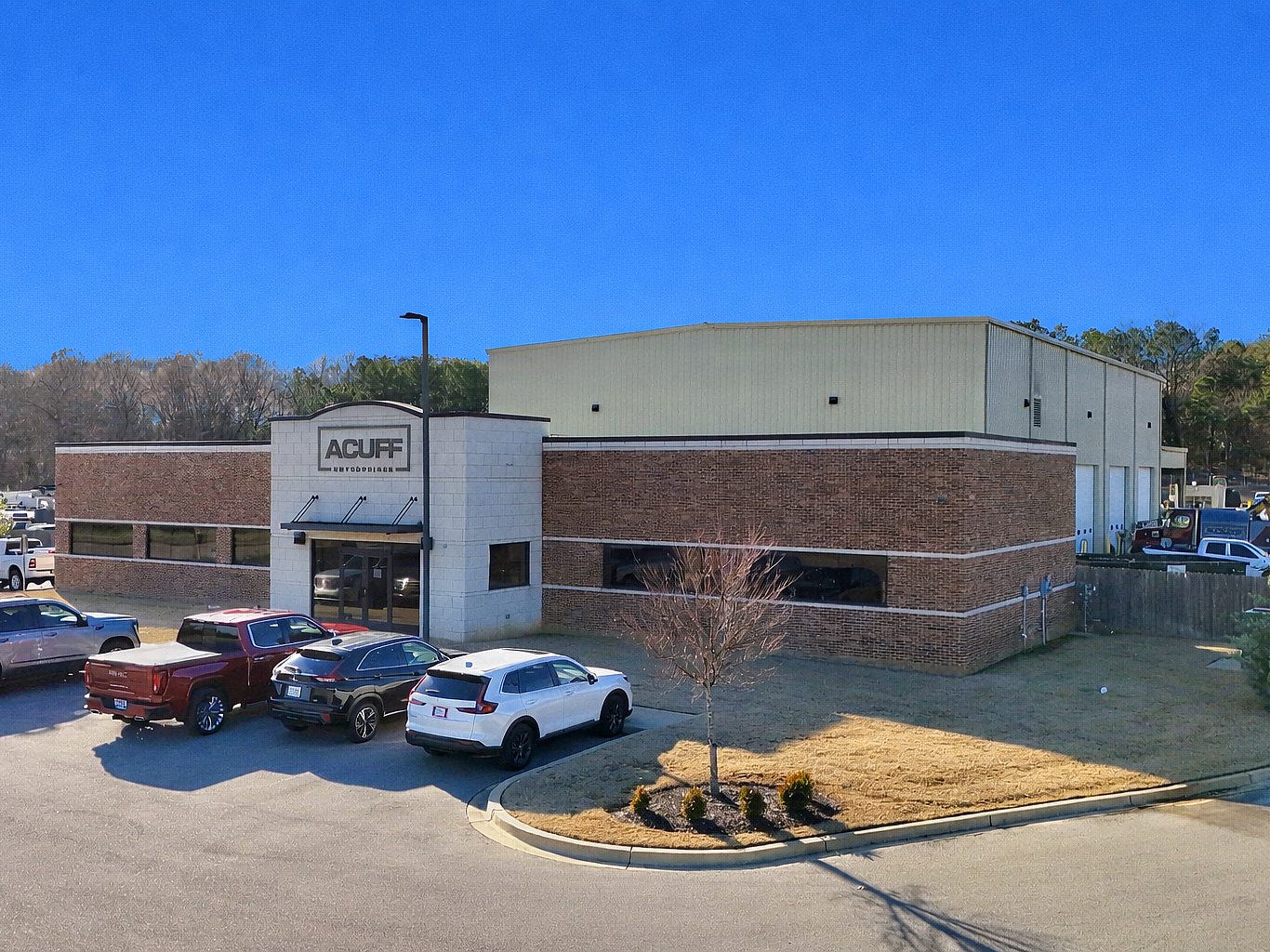 The exterior view of a brick office building