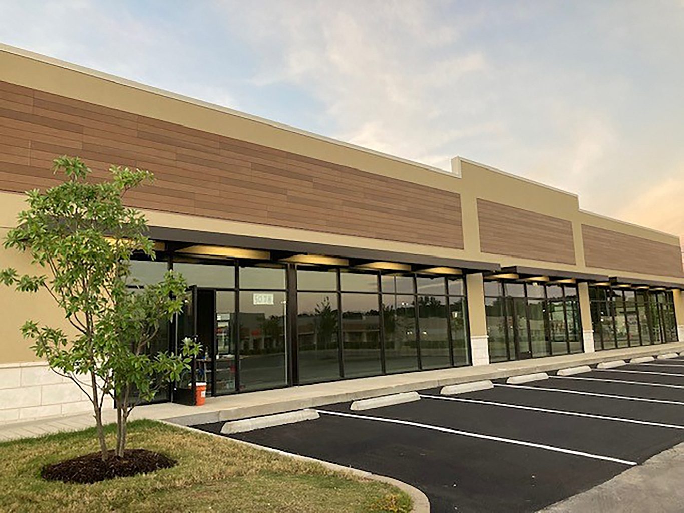 The exterior of a recently constructed shopping center.