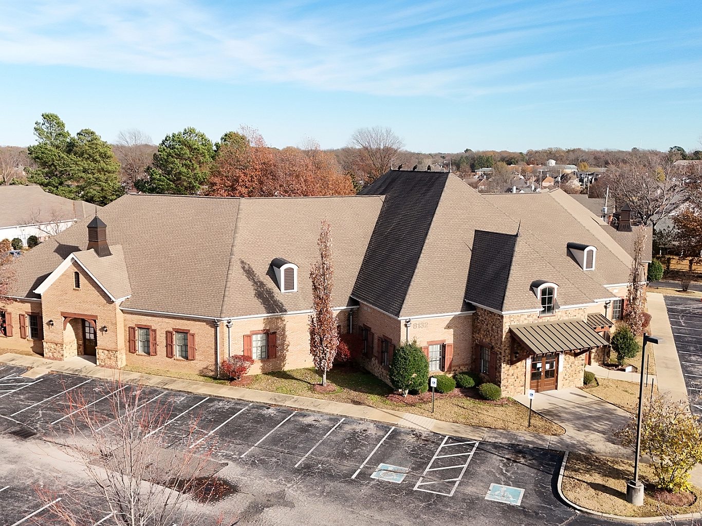 The exterior of a healthcare building from an aerial point of view.