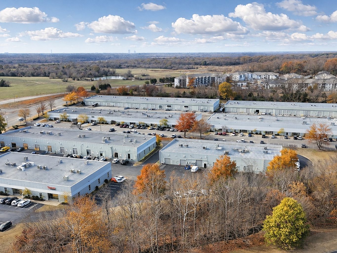 The aerial view of an office complex in the fall.