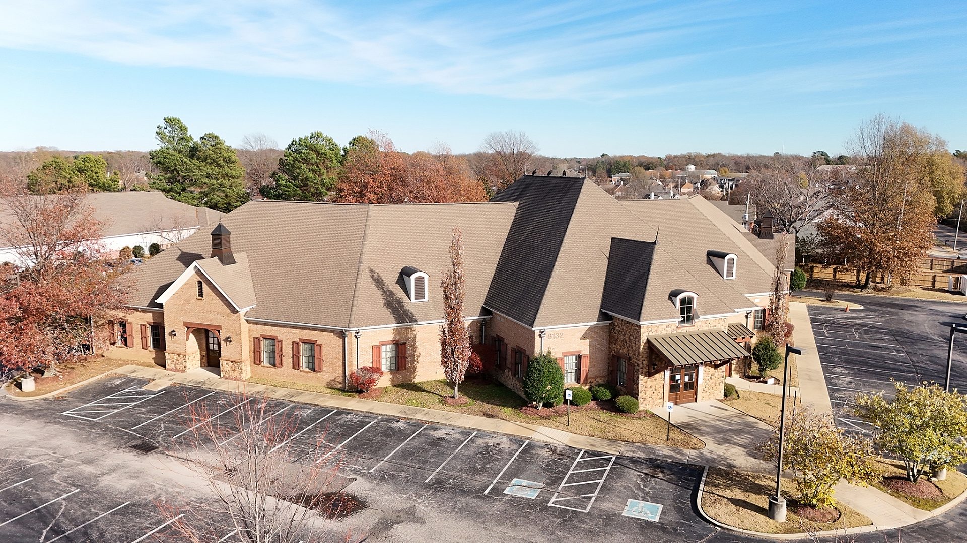 The exterior of a healthcare building from an aerial point of view.