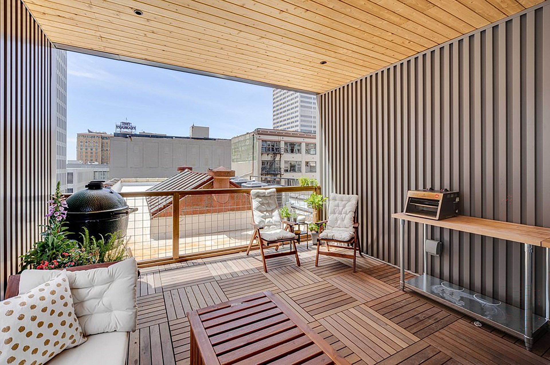 Rooftop lounge of a private residence with modern furniture