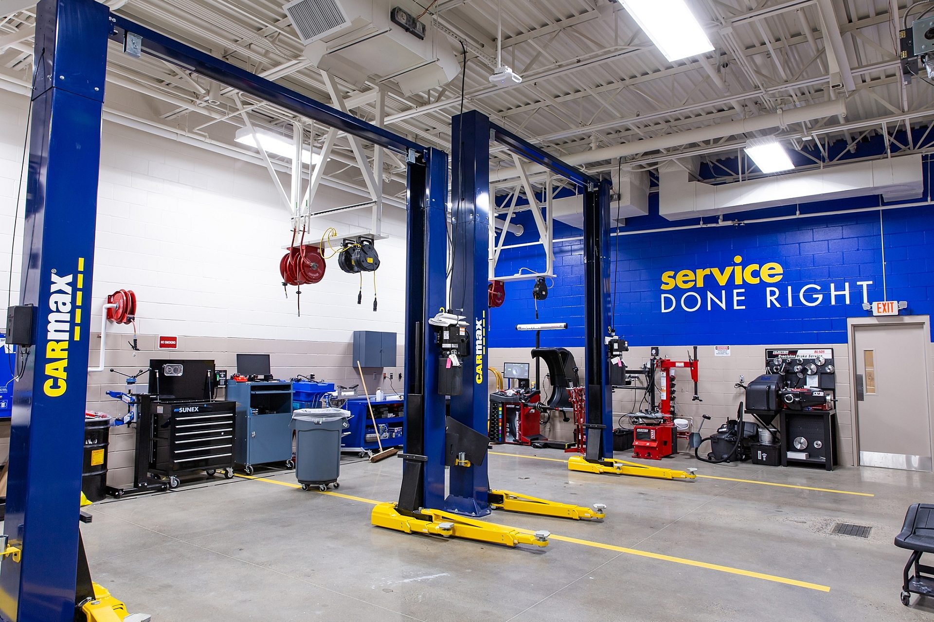 The auto mechanic shop in a CarMax dealership with 3 bays.