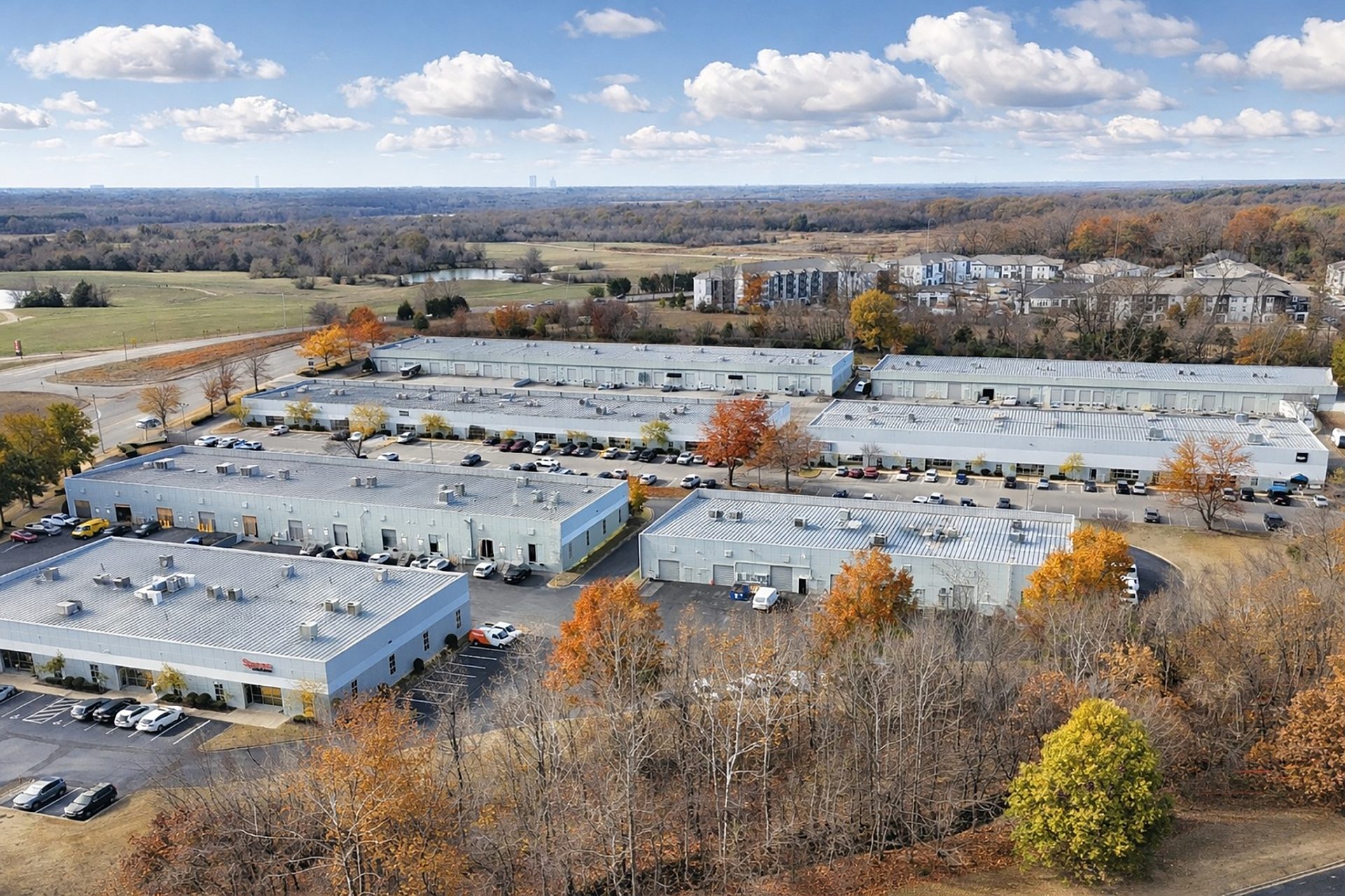 The aerial view of an office complex in the fall.