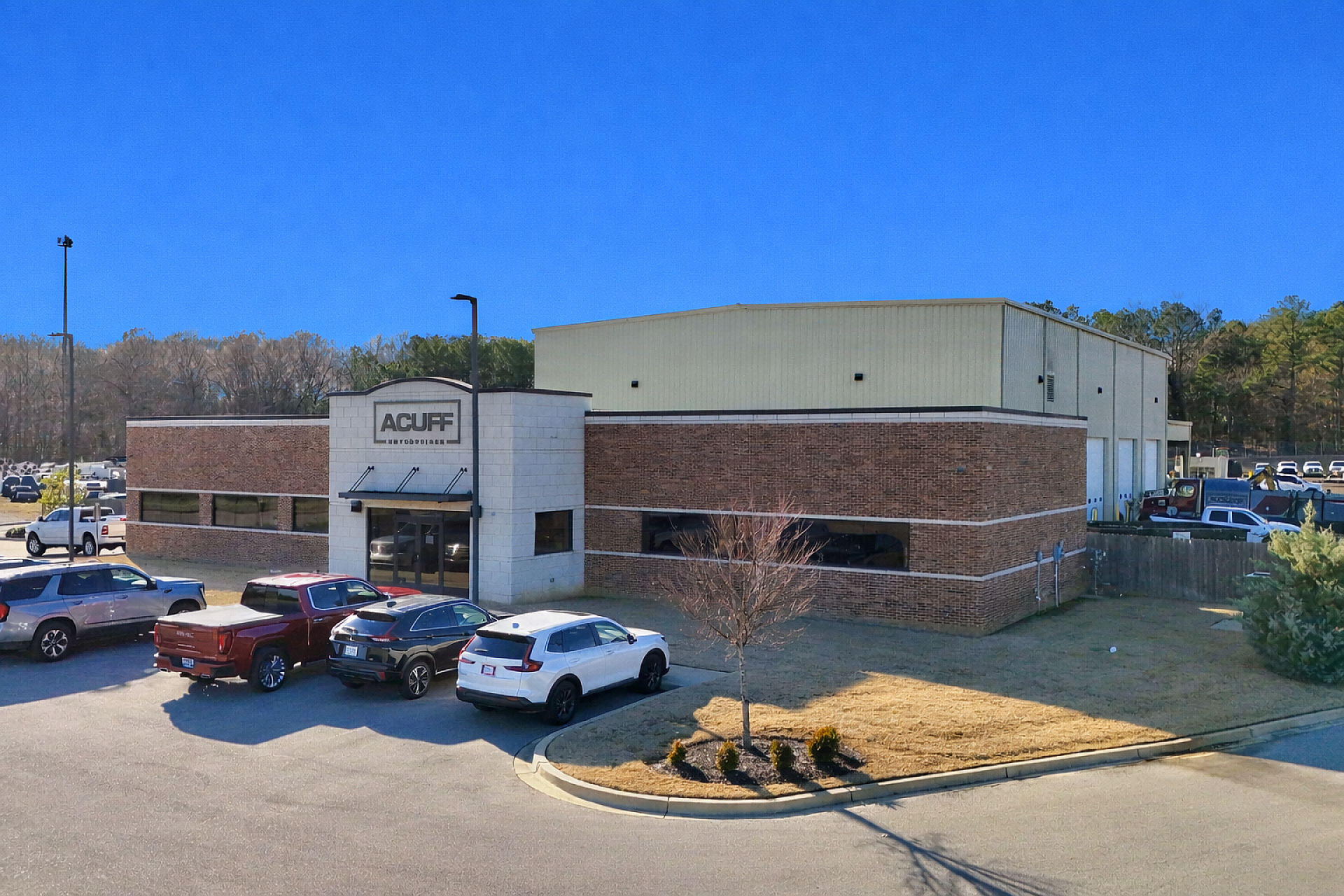The exterior view of a brick office building