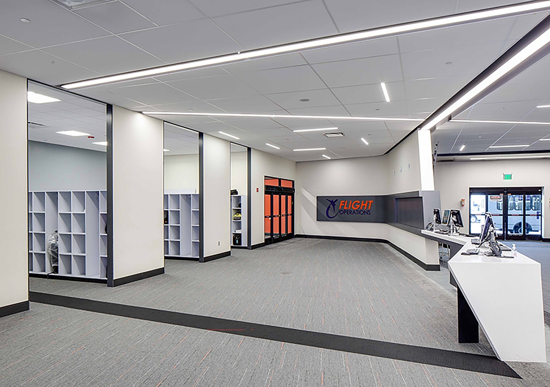 The interior of an office with several rooms containing on the storage on the left.