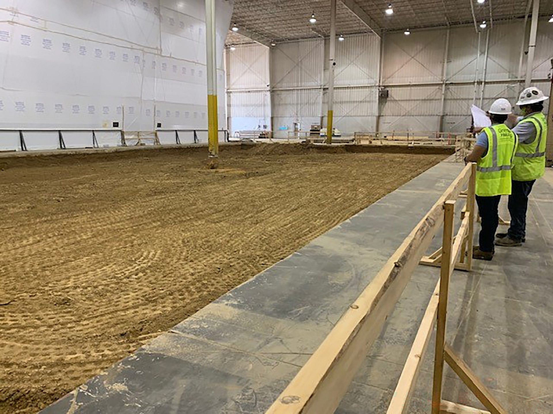 The dirt floor of a building before the foundation has been poured.