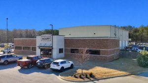 The exterior view of a brick office building