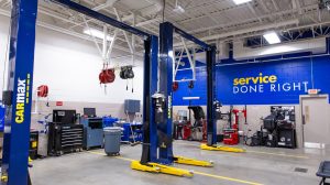 The auto mechanic shop in a CarMax dealership with 3 bays.