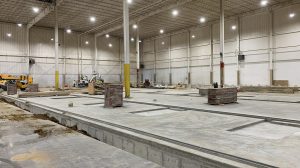 The stone foundation of a building under construction.