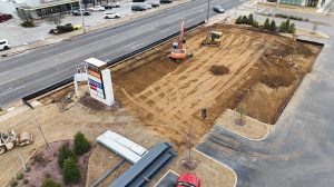 Aerial view of a construction zone for a retail center.