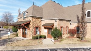 The exterior entrance of a spinal healthcare clinic.