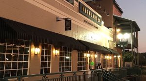 Exterior view of a pub at dusk