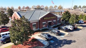 Aerial view of Wells Fargo Bank with cars in the parking lot